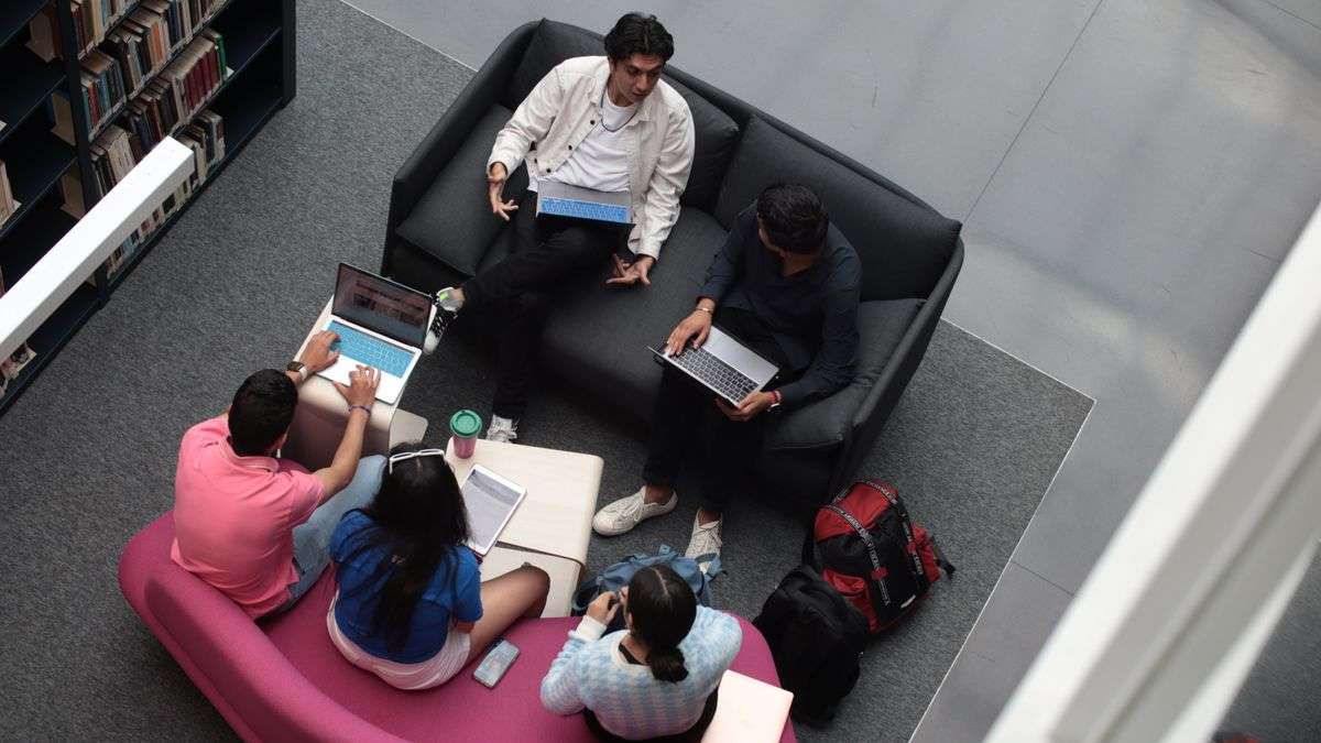 A group of students studying in a library